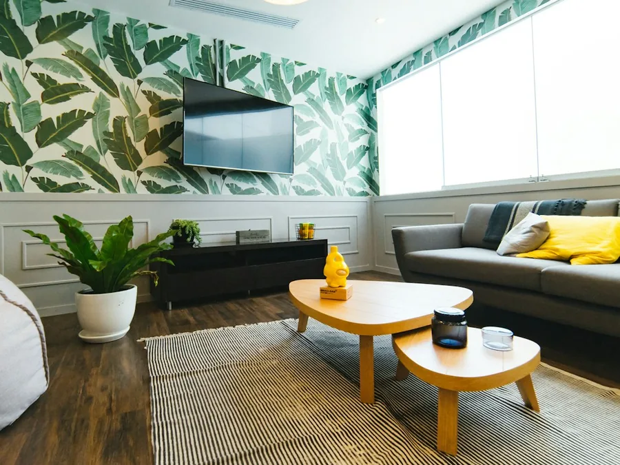Living room with banana leaf wallpaper